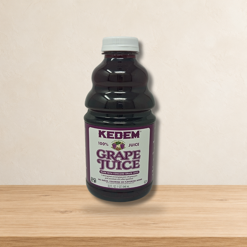 Jugo Kedem envase de plástico 946ml 32Oz — ambientación en estudio claro