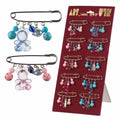 Broche bebe con dijes 58882